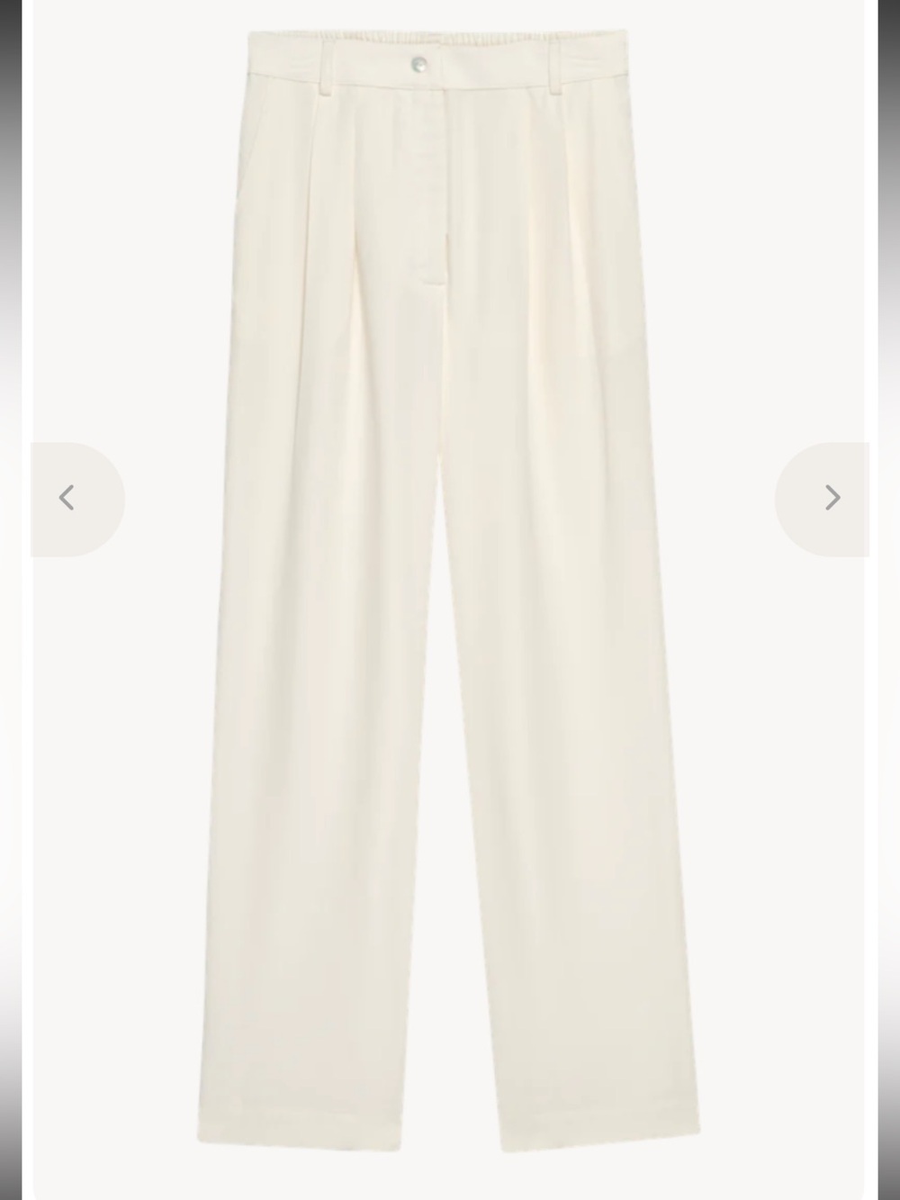 DONNI. Cream colored twill pleated pants women’s size XS